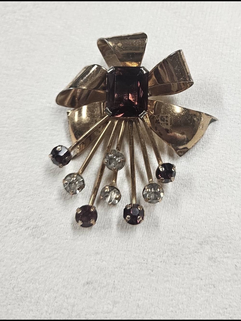 Vintage Signed Leo Glass Gold-Tone Bow Pendant with Garnet and Clear Stones